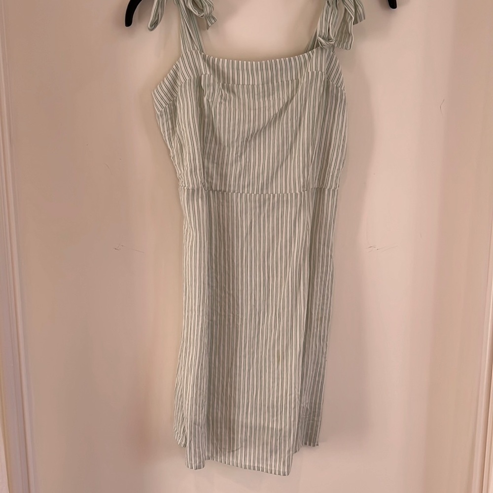 Sage the label white dress with light green stripes, ties at the top with bows